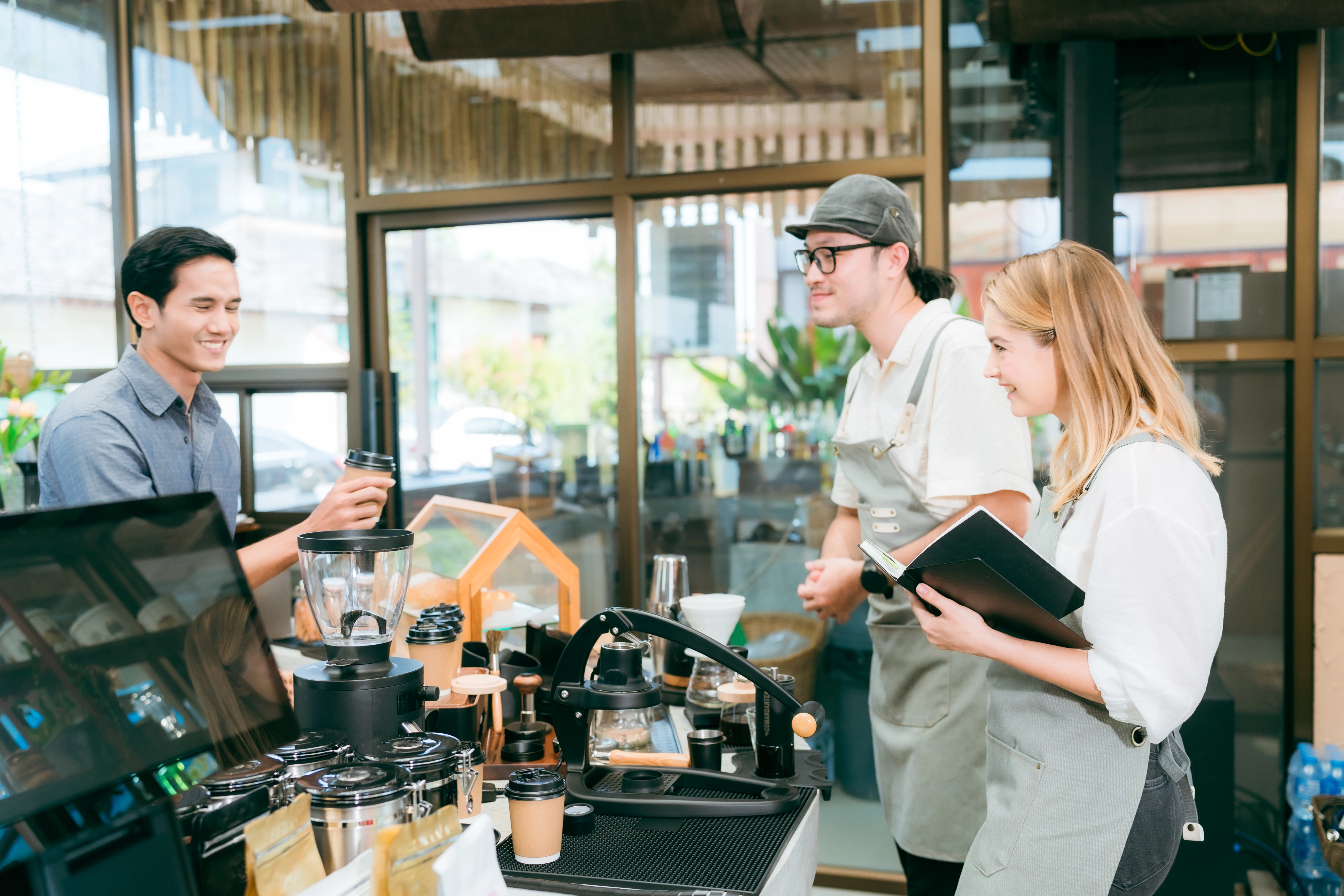 a customer taking coffee order